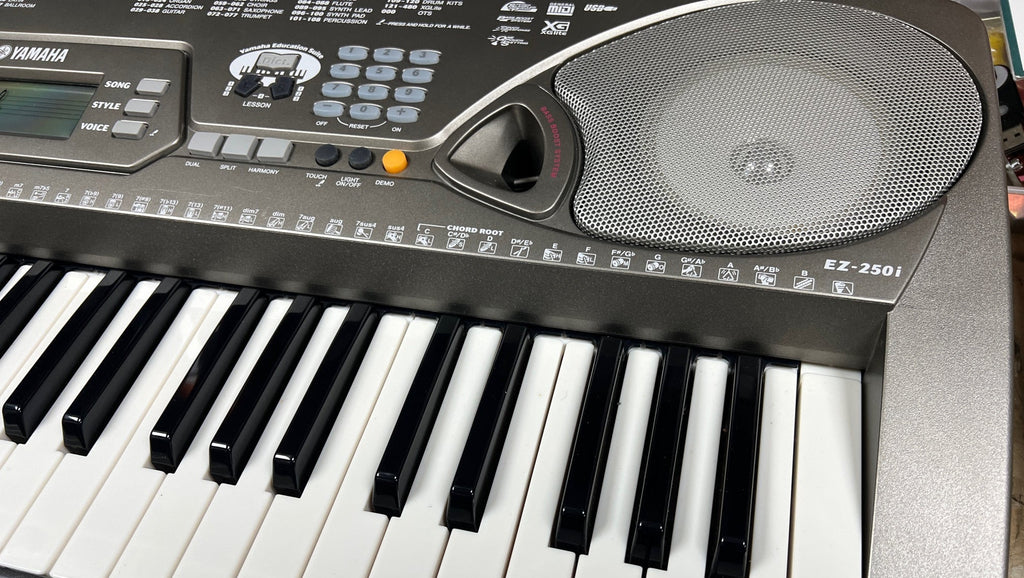 USED Yamaha EZ-250i portable touch responsive lighting keyboard