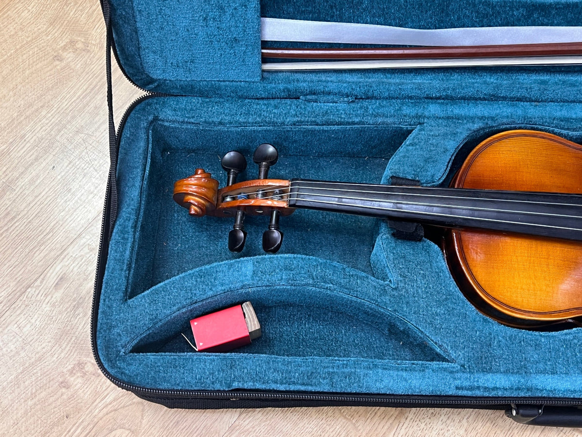 USED 1/2 size violin outfit in oblong case