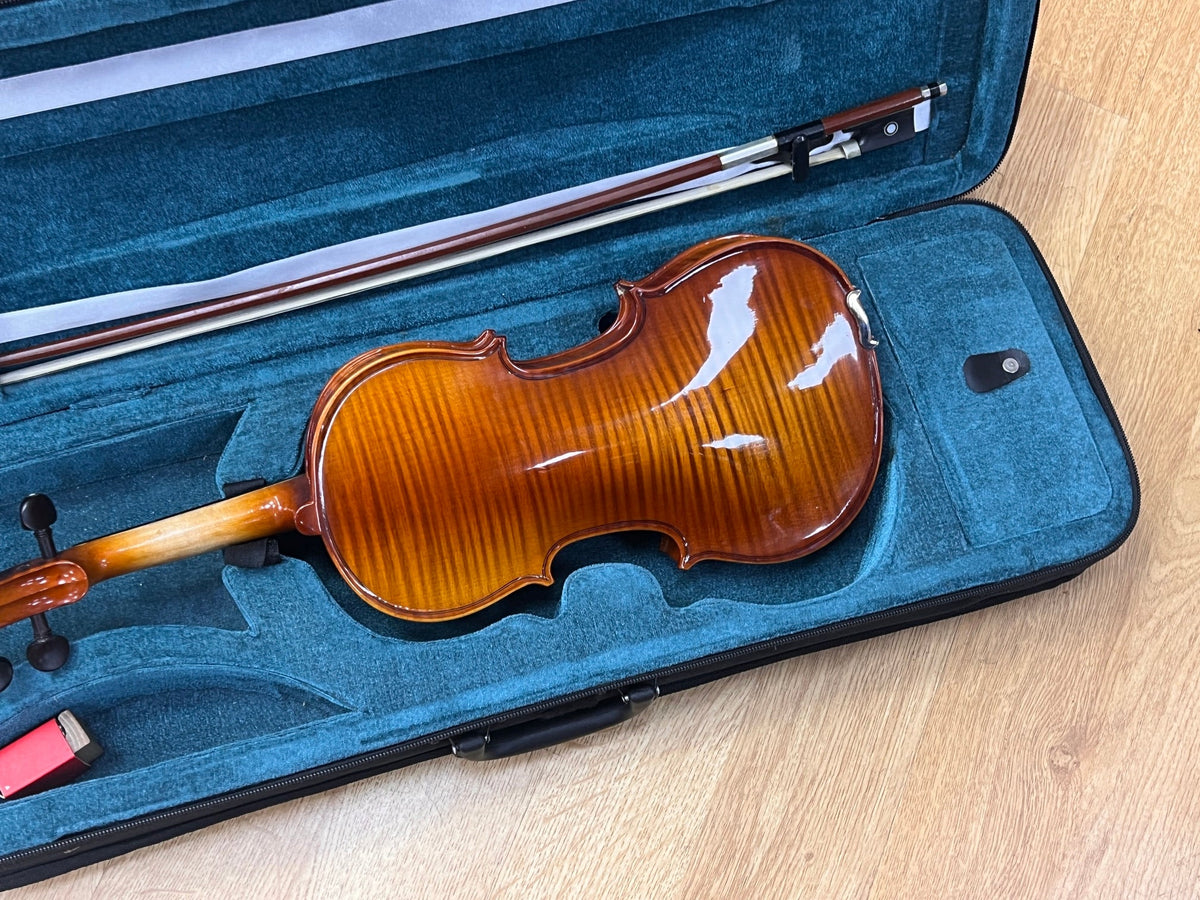 USED 1/2 size violin outfit in oblong case