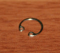Amado waterkey cap retaining spring