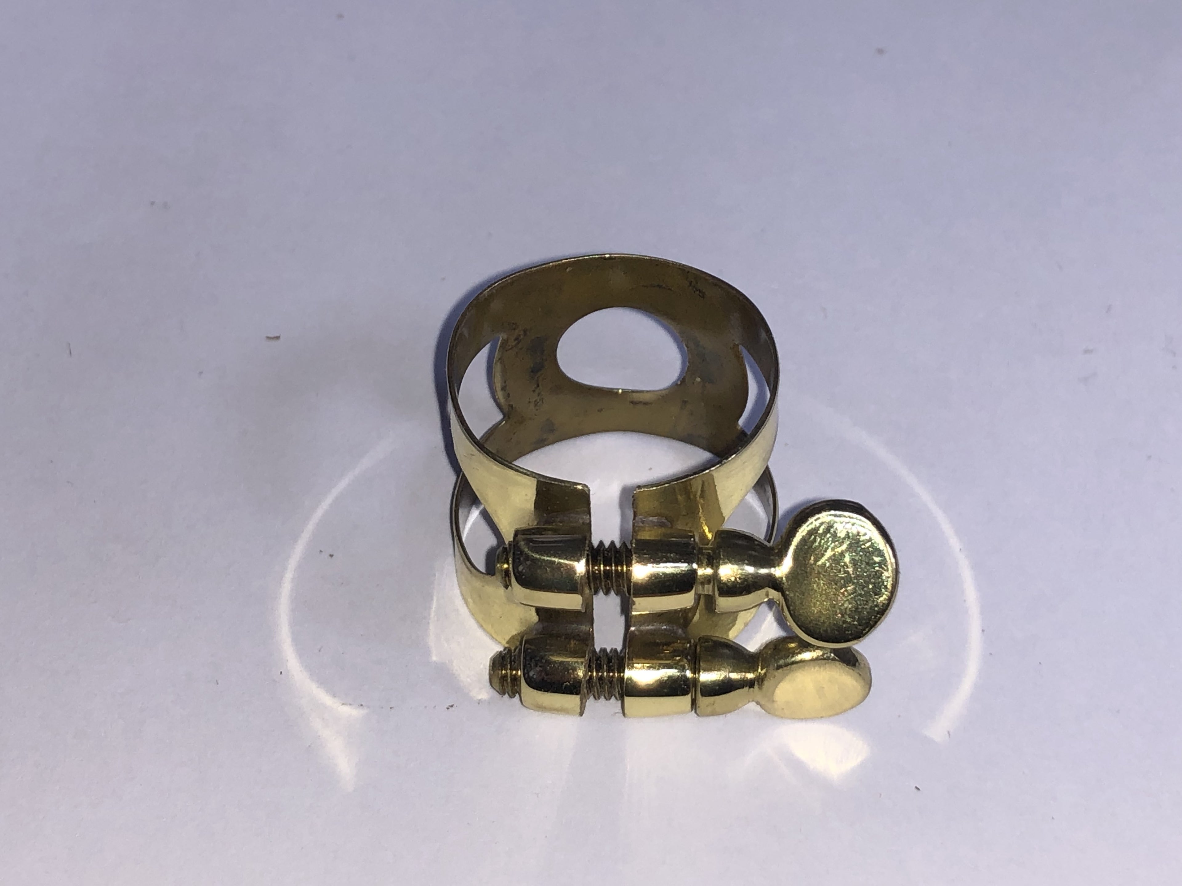 Lacquered soprano saxophone ligature