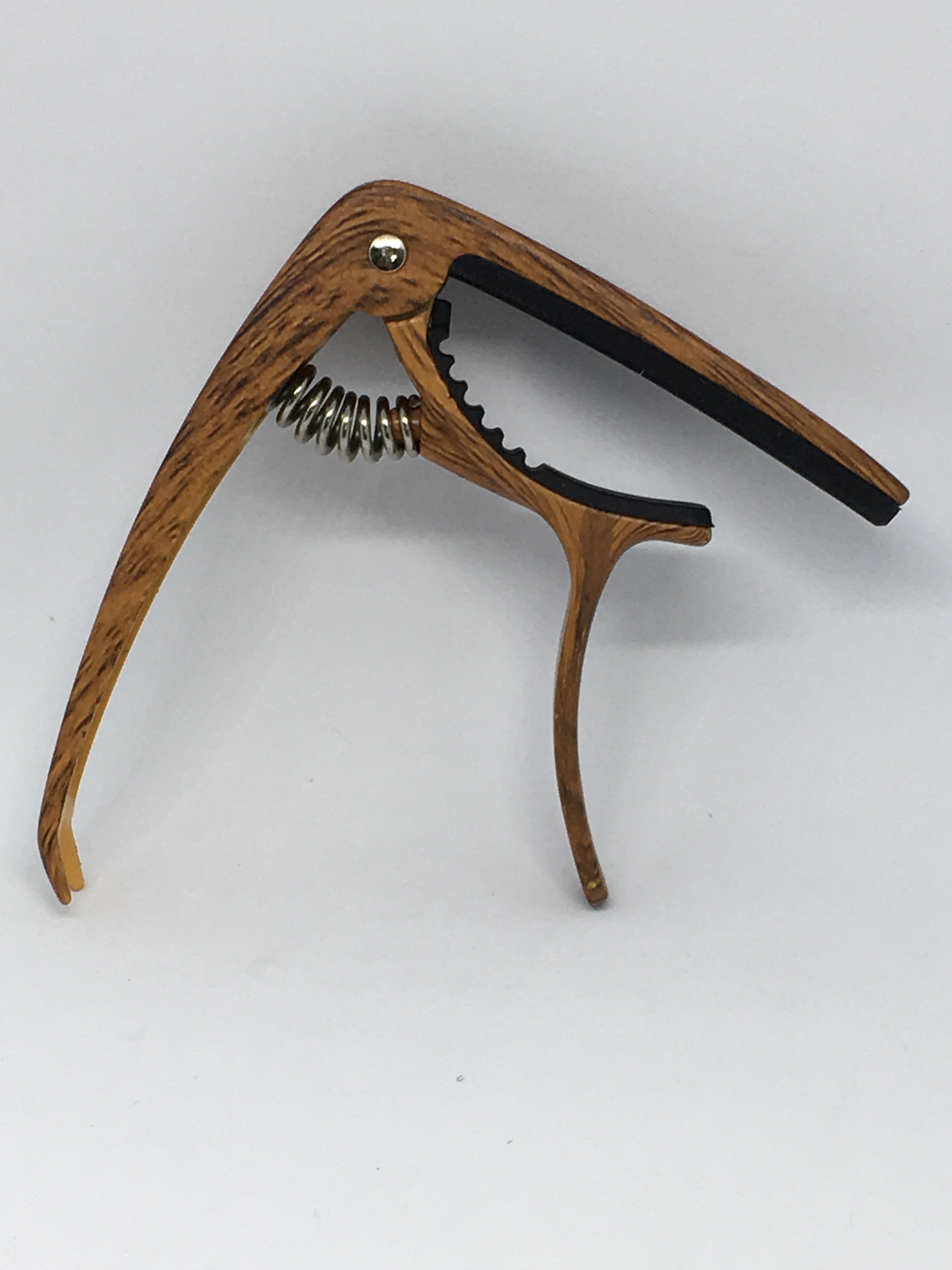 Dark wood effect acoustic / electric guitar capo