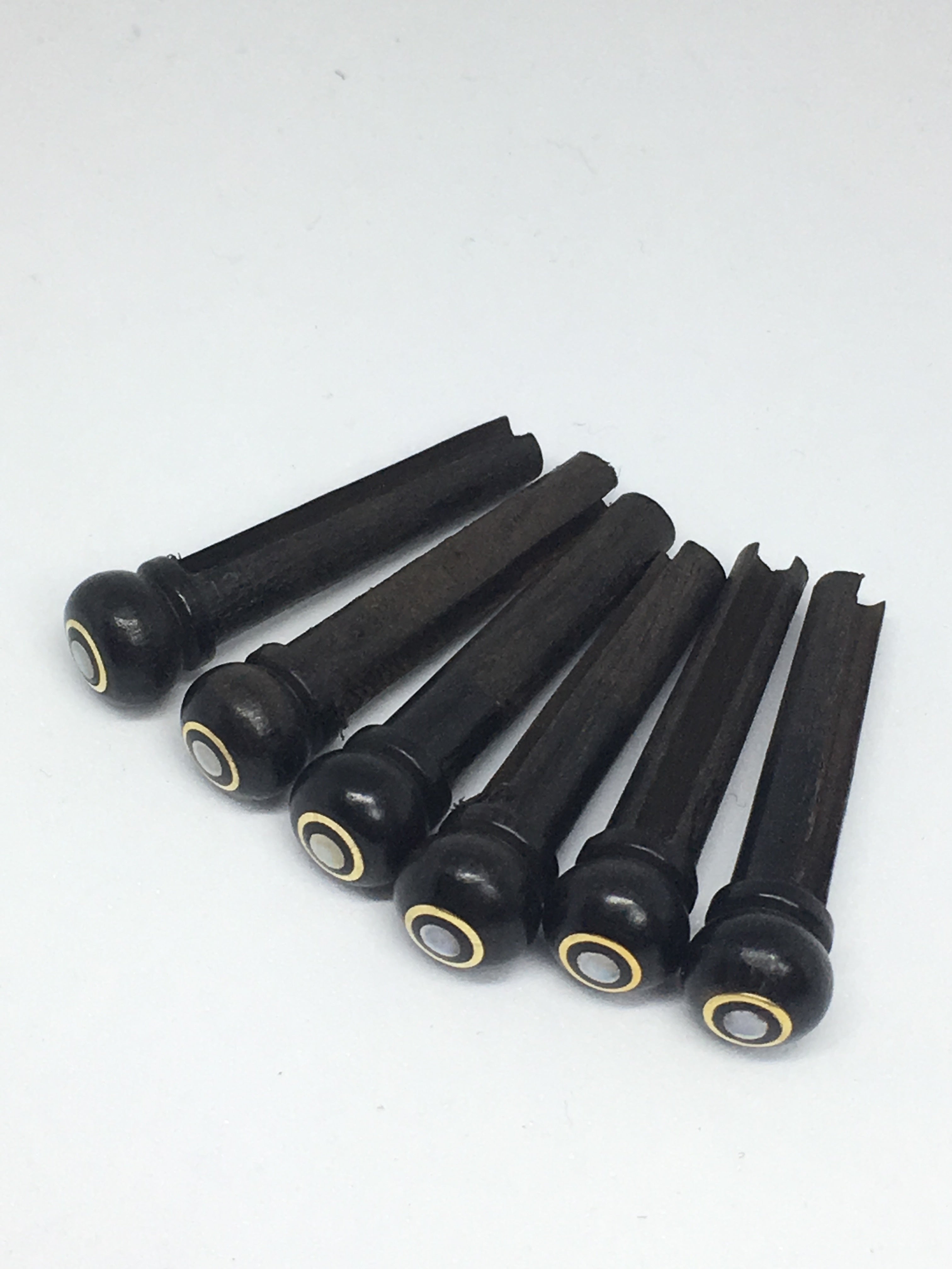 Ebony Wooden Bridge Pins With Parisian Eye Inlay